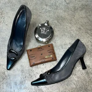 Stuart Weitzman, charcoal suede, and Patent pumps